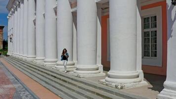 People on column building. Aerial drone view of column building video