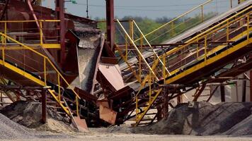 Large equipment in quarry. Mining quarry with lots of machinery at work video
