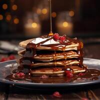 Decadent chocolate pancake stack with raspberry drizzle photo