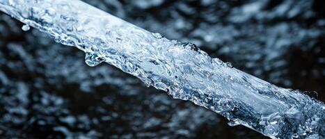 flowing water with splashing droplets photo