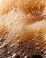 Sparkling golden bubbles abstract background photo