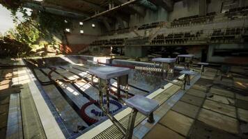 An abandoned swimming pool in an empty and crumbling building video