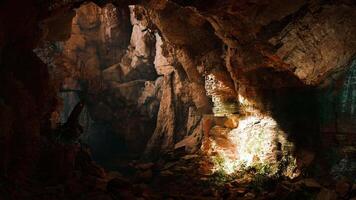 A mysterious cave illuminated by a beam of light video