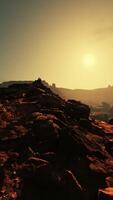 Conqueror of the Red Stone Canyon, Standing Atop a Rocky Mountain video