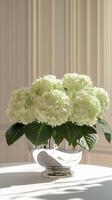 Hydrangeas in a silver bowl with tapers on a tablecloth surface, wallpaper photo