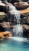 Cascading water over a rock shelf into a pool , wallpaper art photo