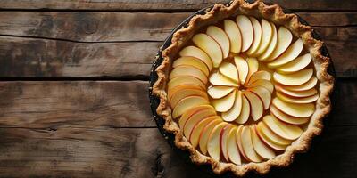 Pie featuring an open top, showing apple slices arranged in a circular pattern, culinary photography photo