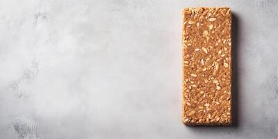 Protein bar on a flat surface with a smooth appearance, food photography photo