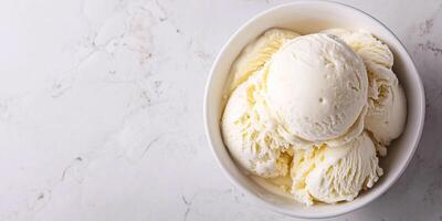 Scoop of ice cream in a bowl, creamy texture and smooth surface, food photography photo