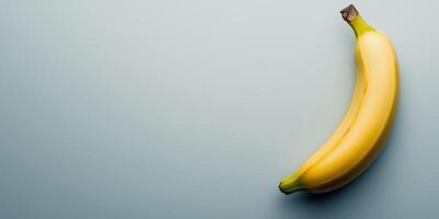 Single banana chip on a smooth background, food photography photo