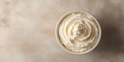 Mousse in a small plain bowl shown from above, with minimalistic presentation, food photography photo