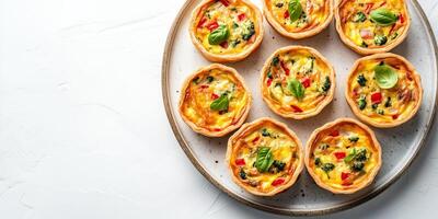 Mini quiches displayed in a circular design on a round serving dish, food photography photo