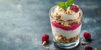 Parfait glass filled with layers of dairy-free ice cream, topped with a small sprig, gastronomy photography photo