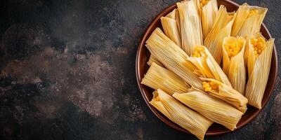 Plate of tamales with neatly wrapped corn husks, arranged side by side on a round dish, photorealistic food photo