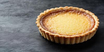 Tart with firm base, filled with lemon mixture, topped with a thin glaze, photorealistic food photo