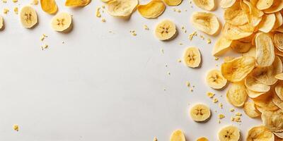 Top view of banana chips scattered on a flat surface, photorealistic food photo