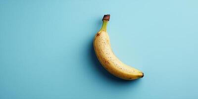 Single banana chip on a smooth background, meal photography photo