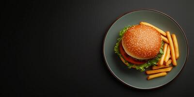Single burger with fries arranged neatly on a plate, meal photography photo