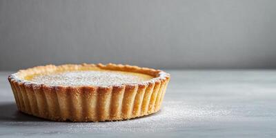 Tart with firm base, filled with lemon mixture, topped with a thin glaze, meal photography photo