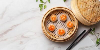 Dim sum displayed in a bamboo steamer basket with chopsticks nearby, food setting photo