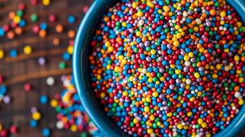 Close-up shot of a bowl containing a mix of multicolored nonpareils, culinary photography photo