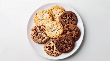 Cookies in a circular pattern on a plain white plate, culinary photography photo
