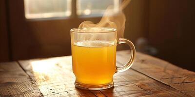 Transparent glass of bone broth with steam rising, set on a wooden table with no other objects, photorealistic food photo