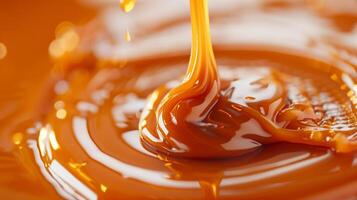 Close-up view of caramel sauce being drizzled onto a flat surface, meal photography photo