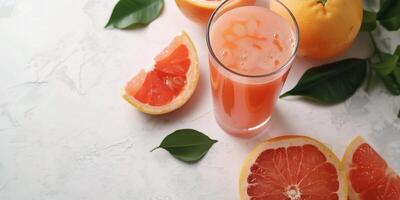 Glass filled with freshly squeezed grapefruit juice, set on a simple white tabletop, meal photography photo