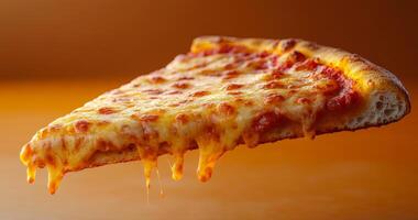 A slice of pizza with melted cheese and sauce. The pizza is on a table and the slice is in the air photo