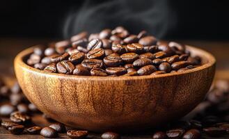 A bowl of coffee beans with a lot of them in it. The bowl is wooden and the beans are scattered all over the table photo