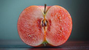 This striking fruit hybrid blends the juicy texture of watermelon with the crispness of an apple, featuring vibrant colors and intricate seed patterns. photo