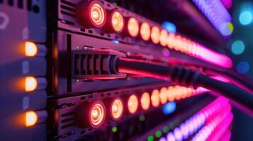 A close-up of a server rack with colorful LED lights and connected cables. photo