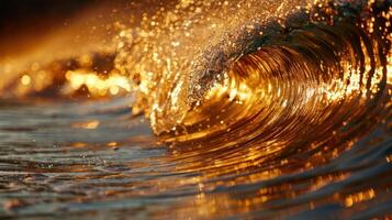 A close-up of a shimmering wave reflecting golden sunlight during sunset. photo