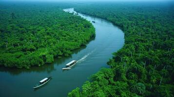 Aerial view of boats navigating a winding river through lush green forest. photo