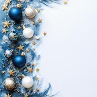 Elegant Blue Ornaments and Gold Stars on a Snowy Background Creating a Festive Atmosphere with White Space for Text Placement photo
