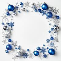 Elegant Blue and Silver Decorative Frame Featuring Scattered Snowflakes and Ornaments with a Blank White Center Suitable for Text Insertion photo