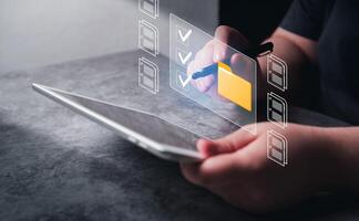 Uploading documents from folder. Open File folder with flying documents with digital tablet. Data transfer backup. File Sharing and document transferring concept. photo