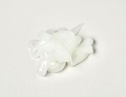 Conditioner or liquid soap drop texture when freshly squeezed from bottle shape isolated on horizontal white background. photo