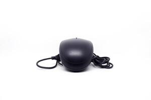 A black computer mouse on a white background photo