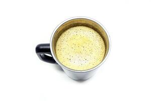 A cup of coffee on a white surface photo