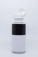 A white and black water bottle with a lid photo