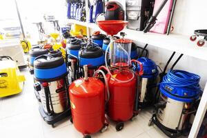 BAKU, AZERBAIJAN - May 20, 2022. Electrical equipment, high-pressure devices for washing cars by Omax are on sale in the store photo