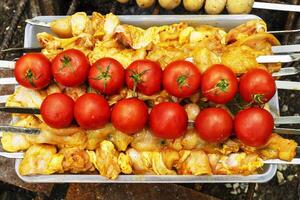 delicious grilled vegetables ,mushrooms, tomato, zucchini, potato photo