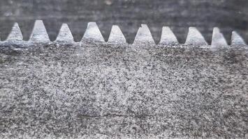 a close up of a metal saw blade photo