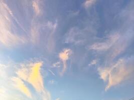 clouds in the blue sky at sunset time, beautiful nature background photo