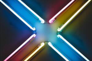 Neon colored tubes glow against a dark background, creating energetic ambiance photo