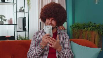 Rich happy man showing wasting or throwing money around hand gesture, profit win lottery, share video