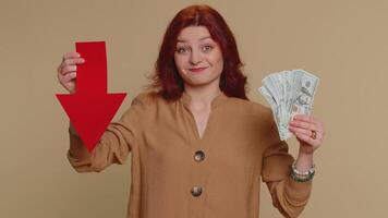 Upset woman showing red arrow pointing down, concept of downgrade bankruptcy money dollar fail, fall video