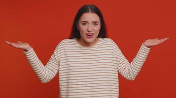Woman raising hands in indignant expression ask why what reason of failure demonstrating disbelief video